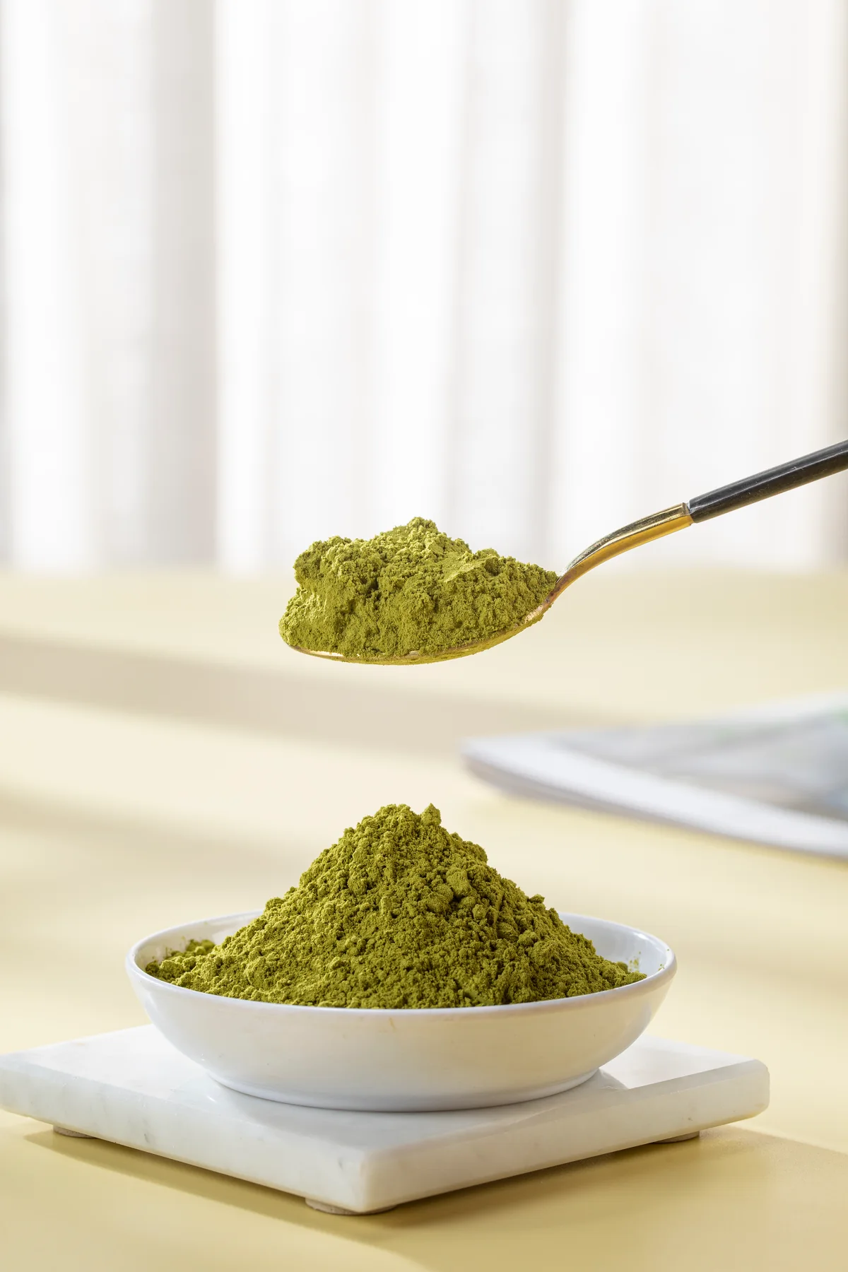 Dry product: Vbleaf Gold supplied photograph showing matcha powder spoon.